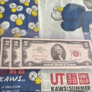 3 consecutive red ink brilliantly uncirculated two dollar bills series 1963.